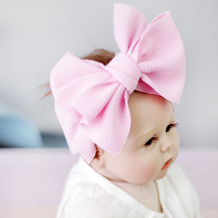 New-born baby's solid-colored bow headband