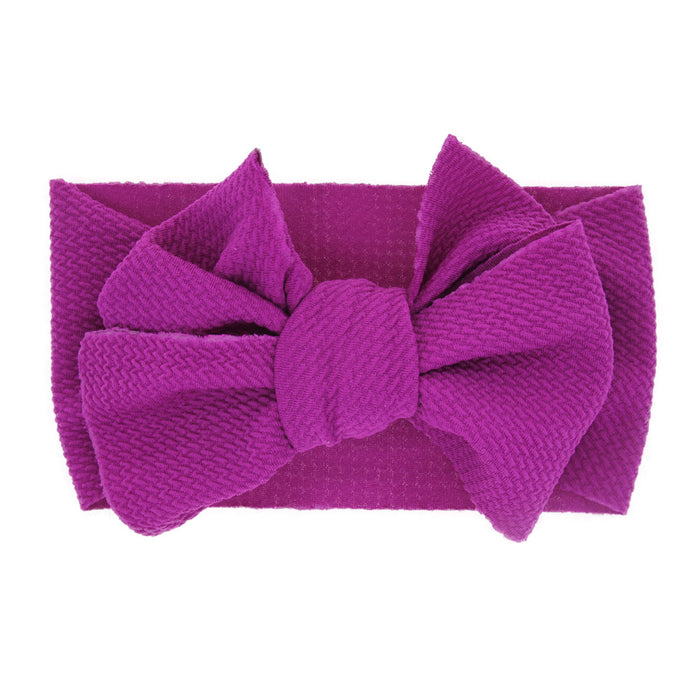 New-born baby's solid-colored bow headband