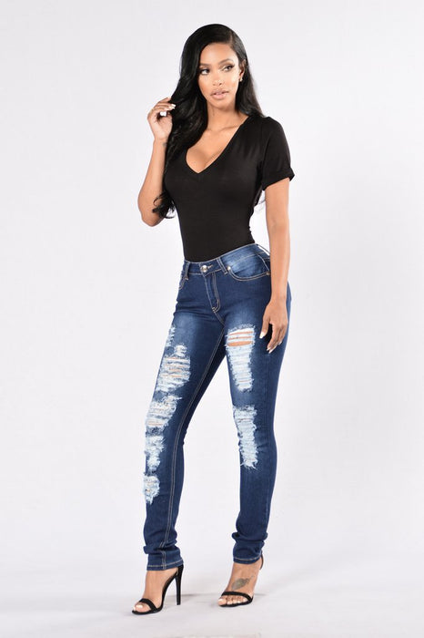 New style denim trousers with ripped jeans