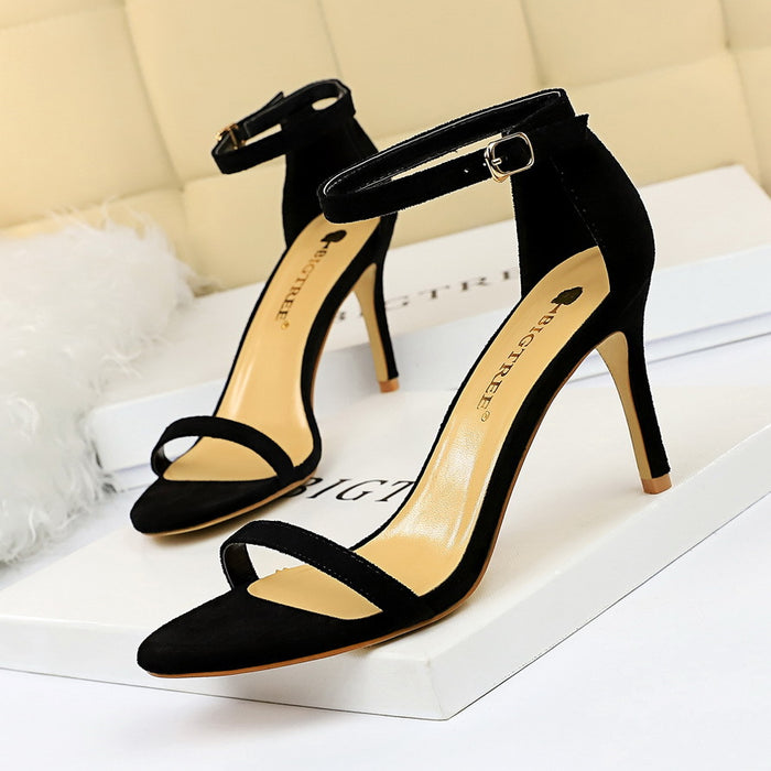 High-heeled suede open-toe pumps