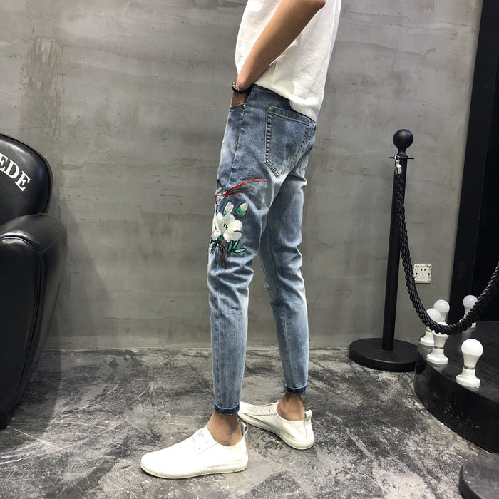 Men's fashion spring hole embroidery heavy craft jeans slim feet trousers