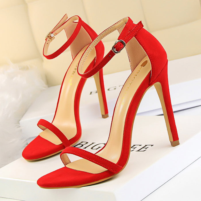 High-heeled suede open-toe pumps