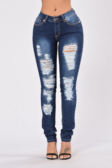 New style denim trousers with ripped jeans