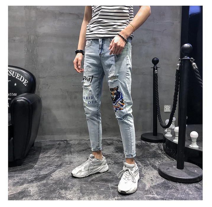 Men's fashion spring hole embroidery heavy craft jeans slim feet trousers