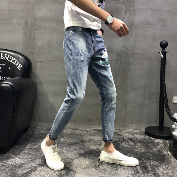 Men's fashion spring hole embroidery heavy craft jeans slim feet trousers