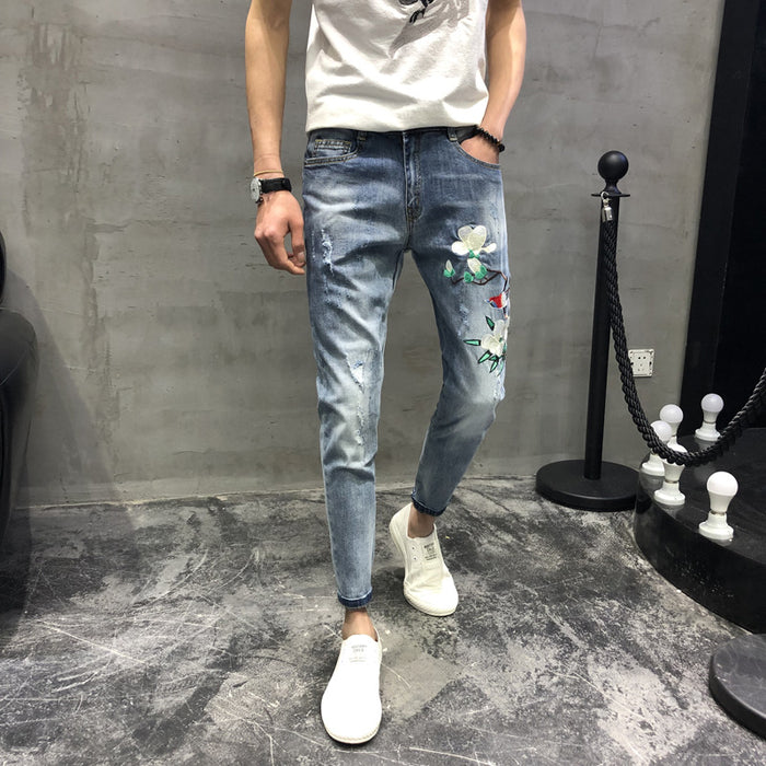 Men's fashion spring hole embroidery heavy craft jeans slim feet trousers