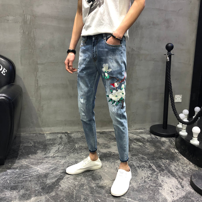 Men's fashion spring hole embroidery heavy craft jeans slim feet trousers