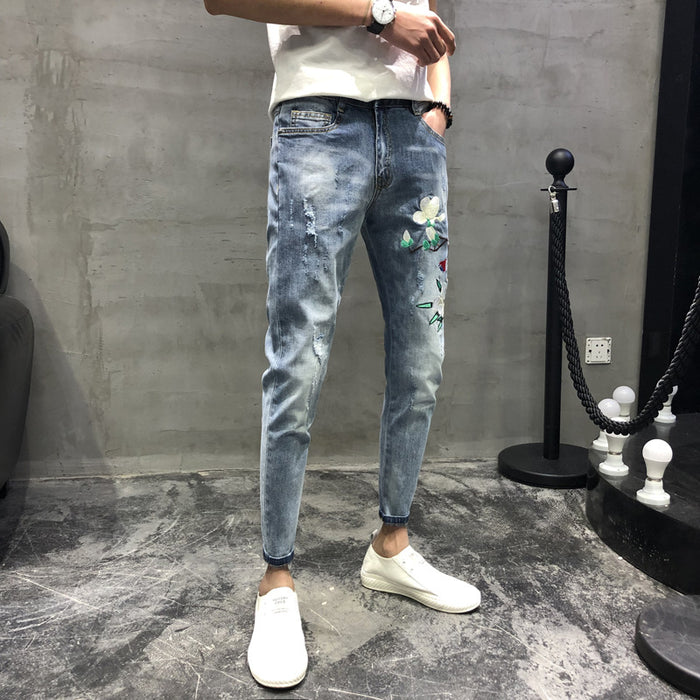 Men's fashion spring hole embroidery heavy craft jeans slim feet trousers