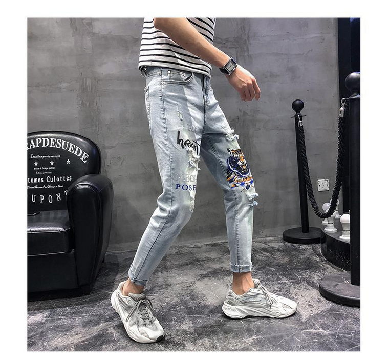 Men's fashion spring hole embroidery heavy craft jeans slim feet trousers