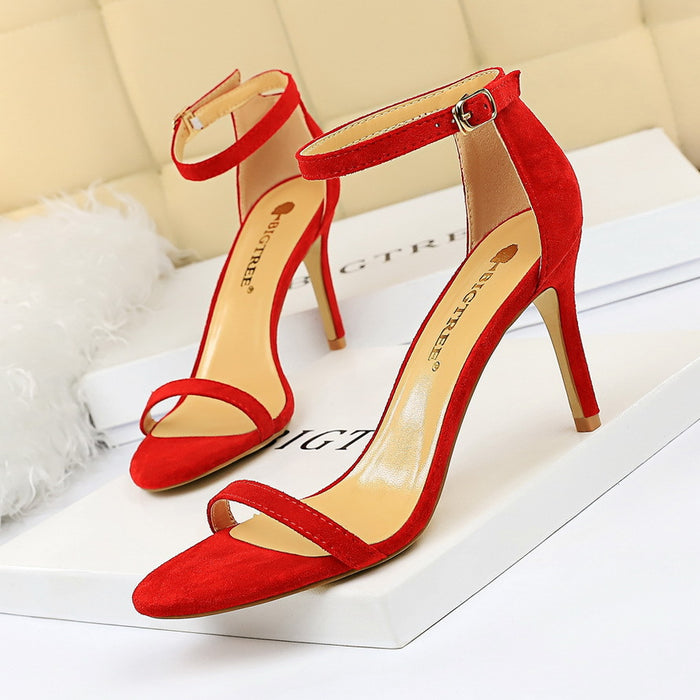 High-heeled suede open-toe pumps