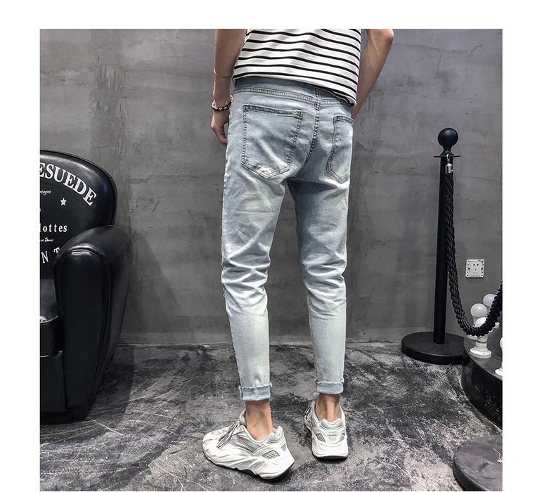 Men's fashion spring hole embroidery heavy craft jeans slim feet trousers