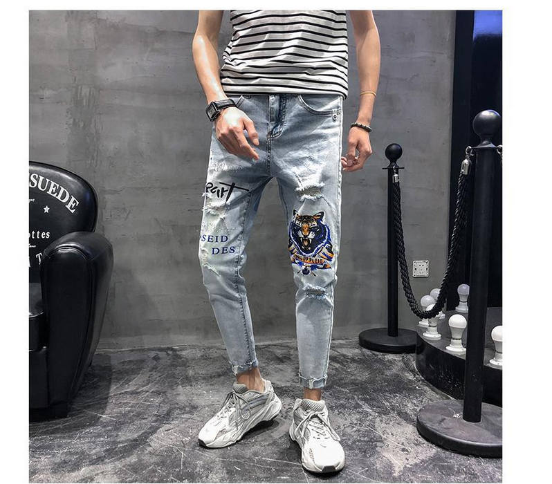 Men's fashion spring hole embroidery heavy craft jeans slim feet trousers